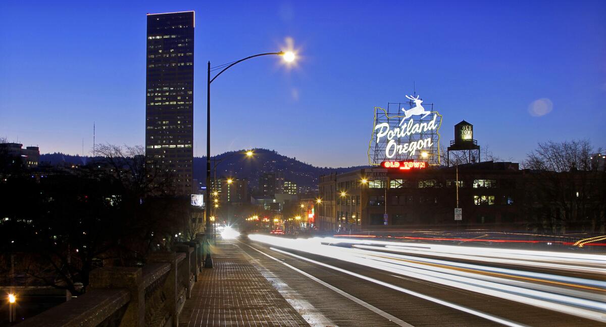 Vehicle lights create streaks over Burnside Bridge in Portland, Ore.