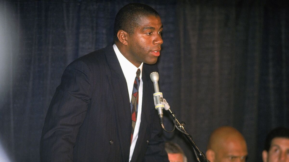 Magic Johnson announces his retirement after being diagnosed as HIV positive.