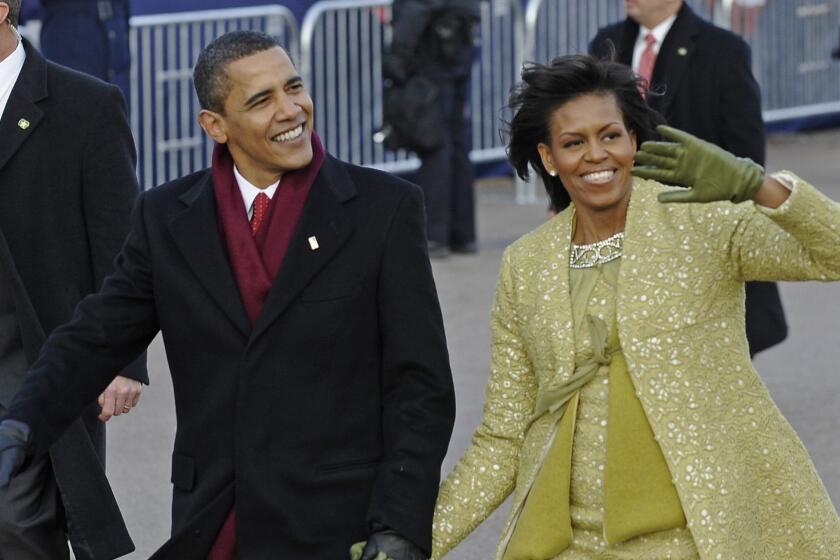 (FILES) In this file photo taken on January 20, 2009, US President Barack Obama and First Lady Michelle walk the Inaugural Parade route after Obama was sworn in as 44th US president in Washington, DC. - Barack Obamas trailblazing presidency began 10 years ago Sunday, a historic moment that some thought would usher in a post-racial America. But the Obama era gave way to Donald Trump and the politics of division. (Photo by Jim WATSON / AFP)JIM WATSON/AFP/Getty Images ** OUTS - ELSENT, FPG, CM - OUTS * NM, PH, VA if sourced by CT, LA or MoD **