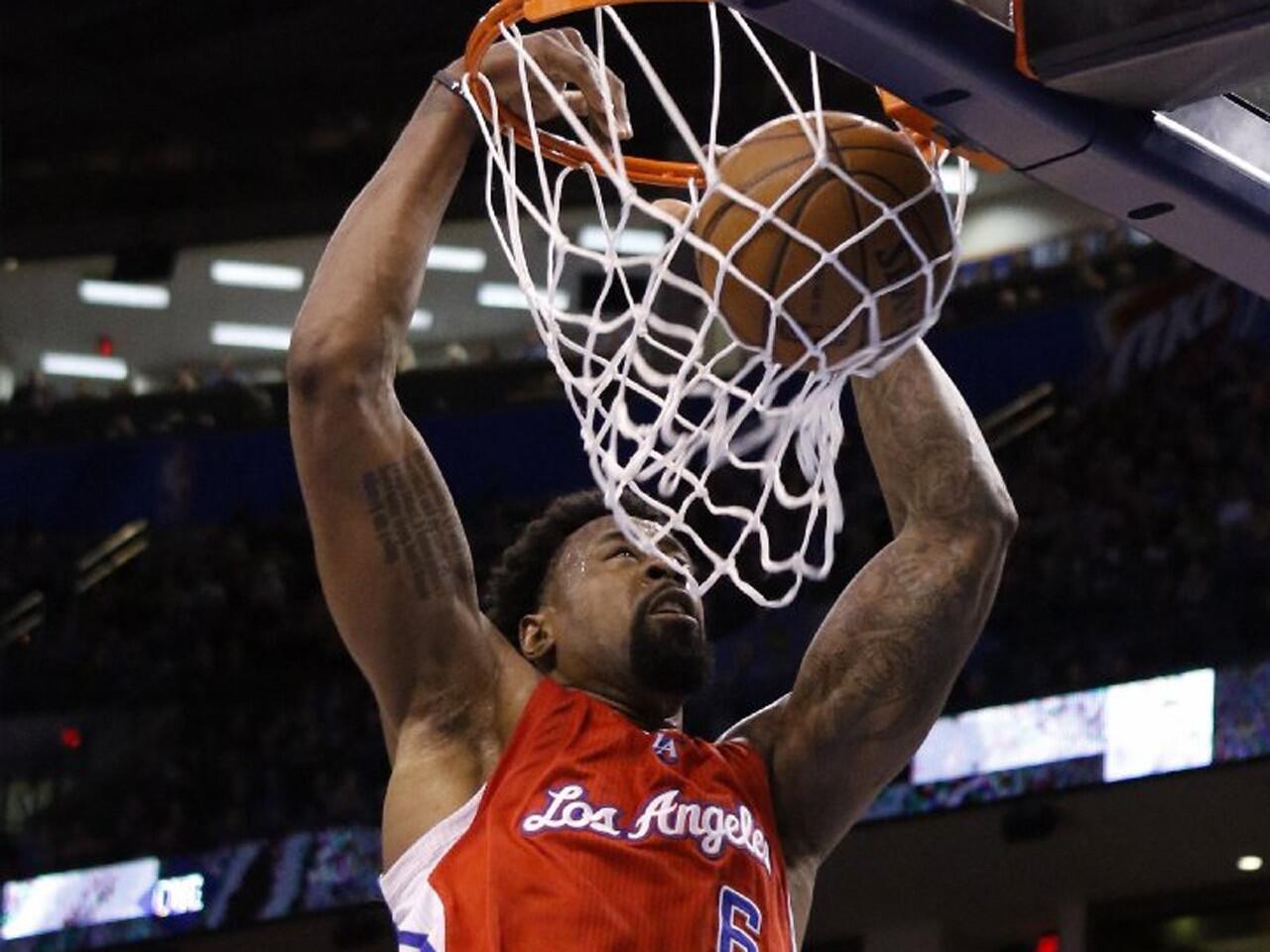 Clippers center DeAndre Jordan dunks in the first quarter of a 120-108 win against the Thunder.