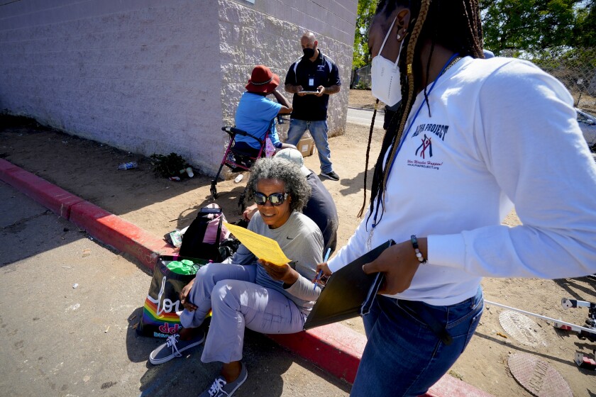 On June 1, in San Diego, CA., outreach workers spoke to a small group near Int. 5 freeway Imperial Avenue offramp.