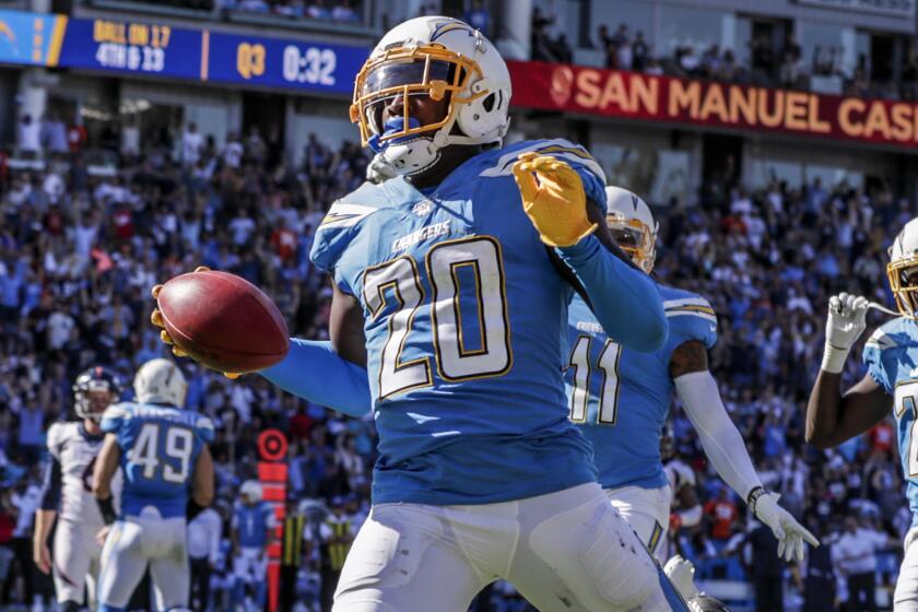 CARSON, CA, SUNDAY, OCTOBER 6, 2019 - The LA Los Angeles Chargers defensive back Desmond King (20) scores on a 68-yard punt return during third quarter action against the Broncos at Dignity Health Sports Park. (Robert Gauthier/Los Angeles Times)