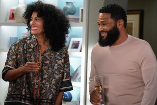 Tracee Ellis Ross and Anthony Anderson in "black-ish" on ABC.