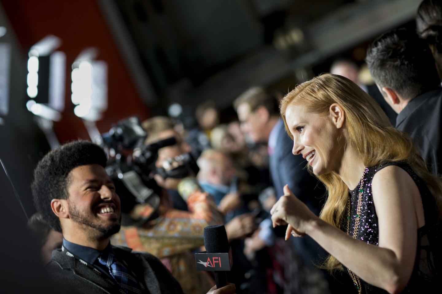 Actress Jessica Chastain works the red carpet for the AFI Fest's closing night gala presentation of the film "Molly's Game" on Thursday at TCL Chinese Theatre in Hollywood.