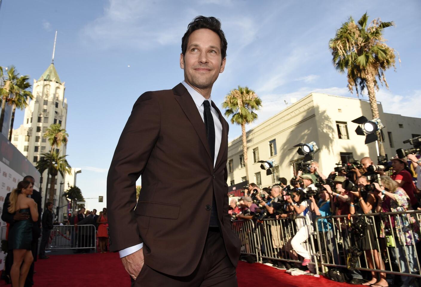 Paul Rudd, star of "Ant-Man," walks the red carpet at the premiere of the film.