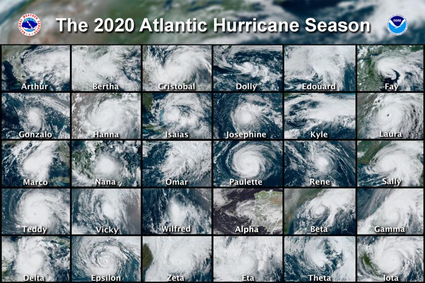 FILE - This combination of satellite images provided by the National Hurricane Center shows 30 hurricanes which occurred during the 2020 Atlantic hurricane season. According to a forecast by the U.S. National Oceanic and Atmospheric Administration released on Thursday, May 20, 2021, they expect another busy Atlantic hurricane season for 2021, but it won't be as crazy as the previous year's record breaker. (National Hurricane Center via AP, File)