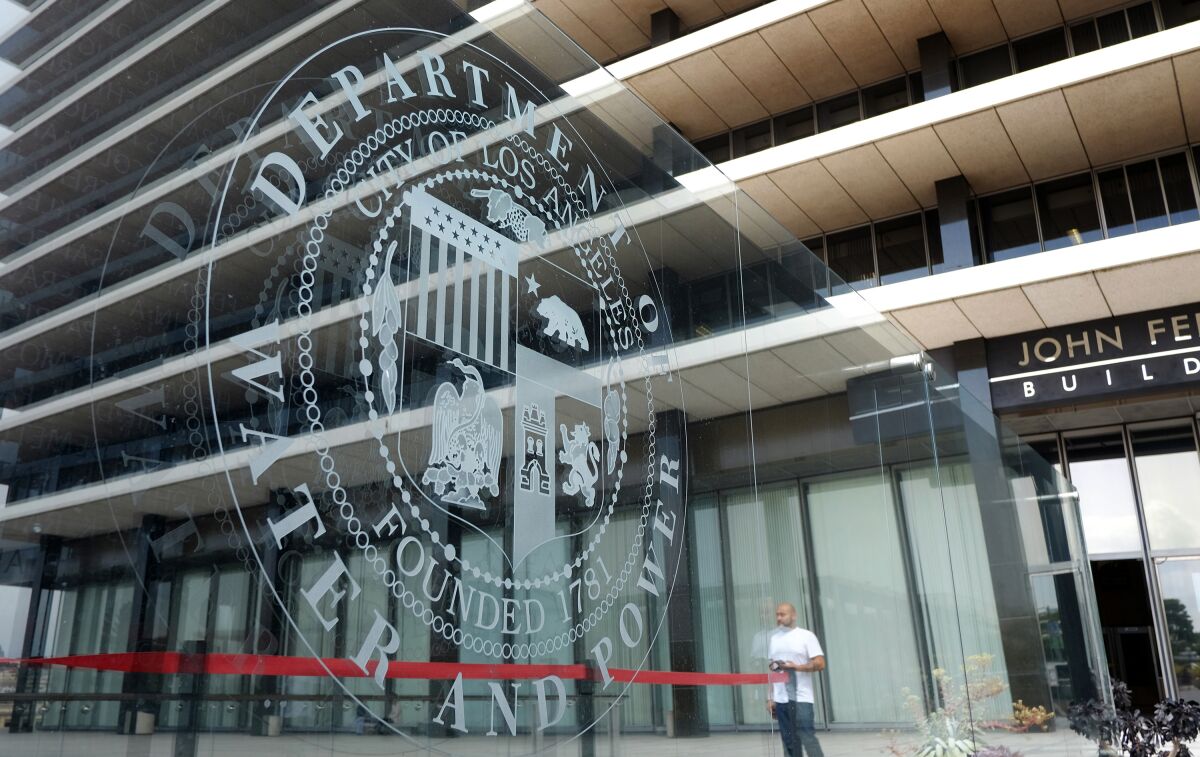 The Los Angeles Department of Water and Power's seal etched in glass on a building
