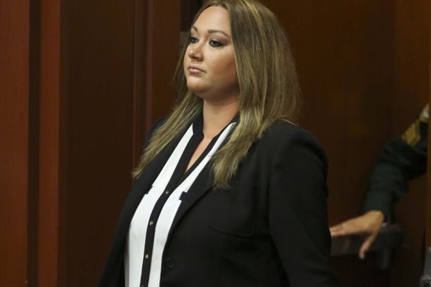 Shellie Zimmerman, wife of George Zimmerman, pleads guilty to a lesser form of perjury at the Seminole County Courthouse in Sanford, Fla.