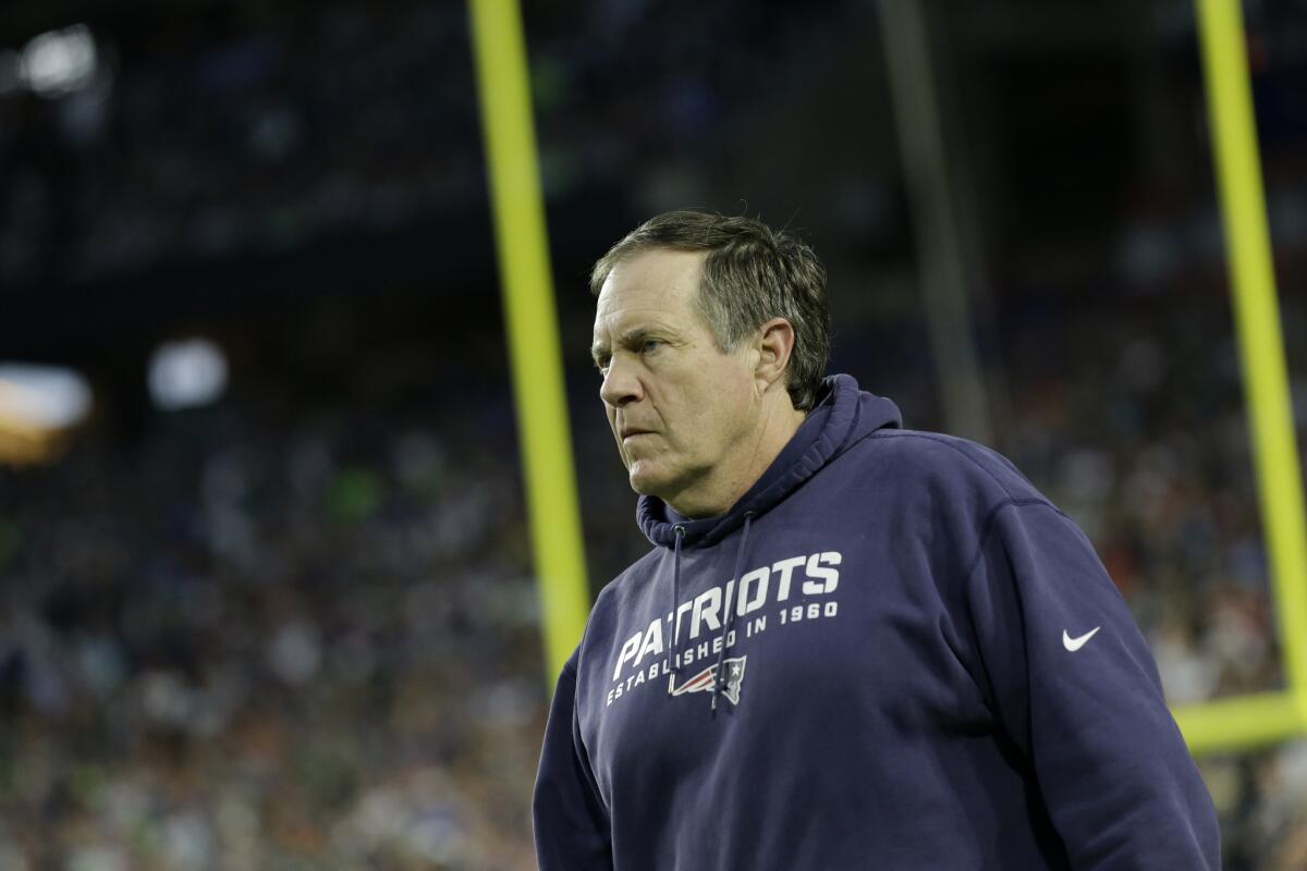 New England Patriots Coach Bill Belichick watches the action during the Super Bowl in Glendale, Ariz., on Feb. 1.