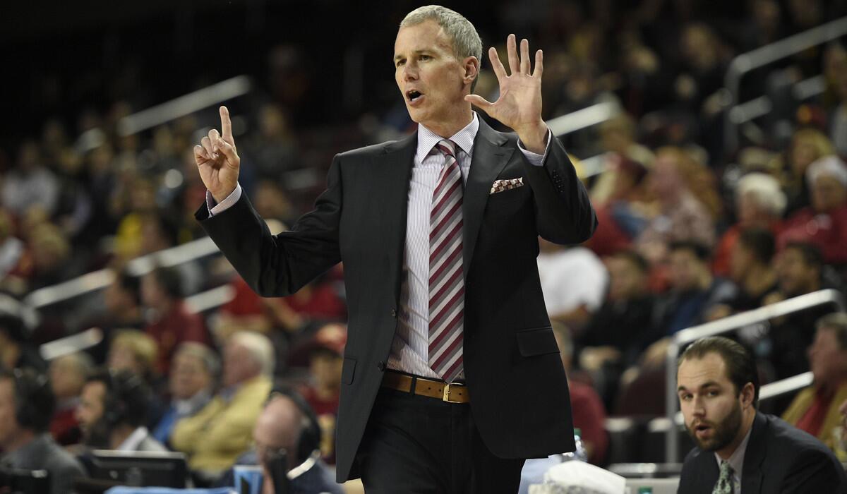 USC Coach Andy Enfield calls a play during the first half against Cornell on Monday.