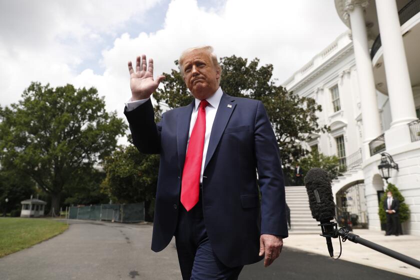 President Donald Trump waves as he walks to board Marine One on the South Lawn of the White House in Washington, Thursday, Aug. 6, 2020, for a short trip to Andrews Air Force Base, Md. and then on to Cleveland, Ohio. (AP Photo/Andrew Harnik)