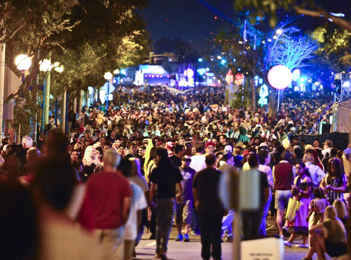 Tens of thousands of attendees crowd Santa Monica Blvd for the 2015 West Hollywood Halloween Carnival.