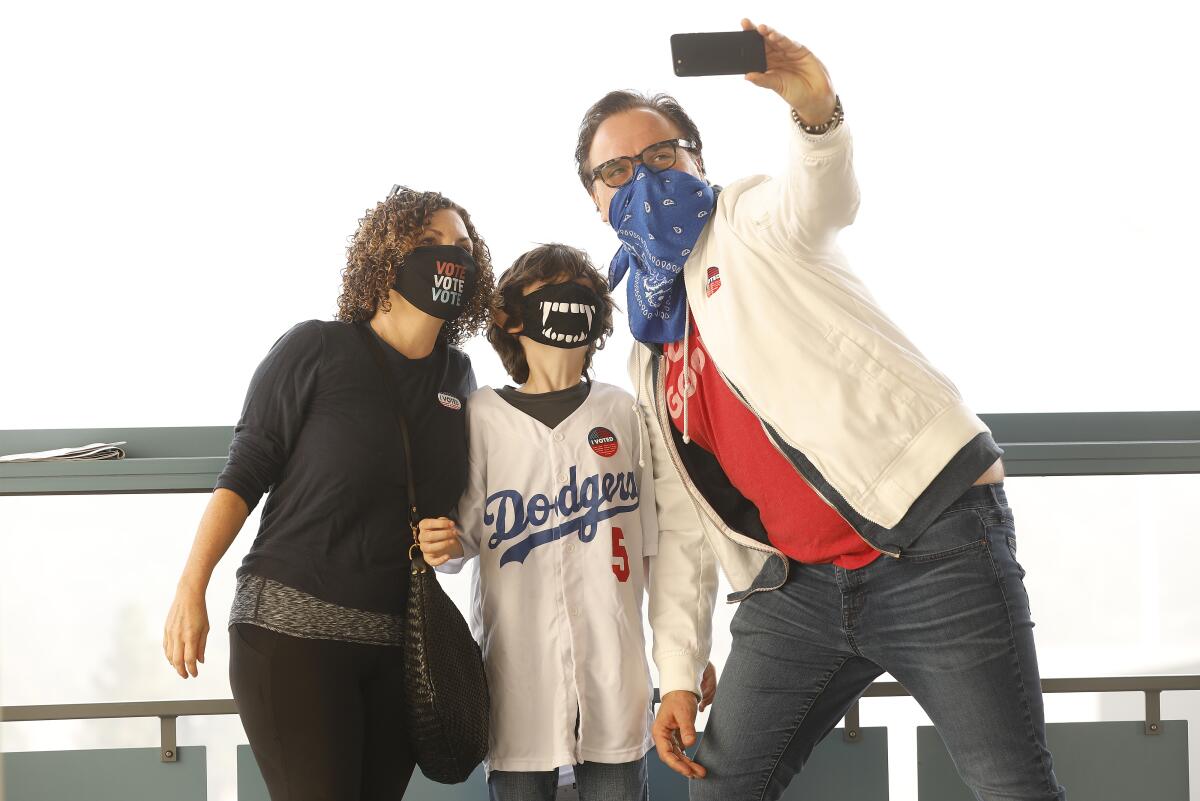 The Young takes a selfie as they came to Dodgers Stadium in Elysian Park to vote in the 2020 general election