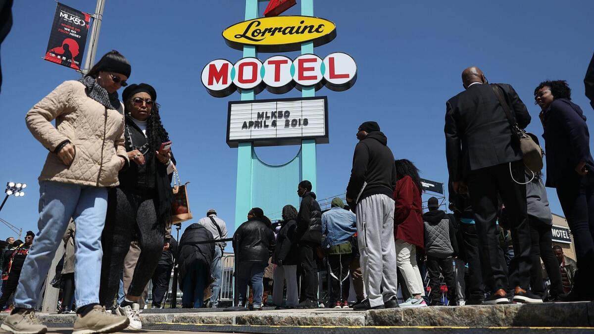 People gather at the Lorraine Motel, which is now part of the National Civil Rights Museum, on Wednesday in Memphis, Tenn.