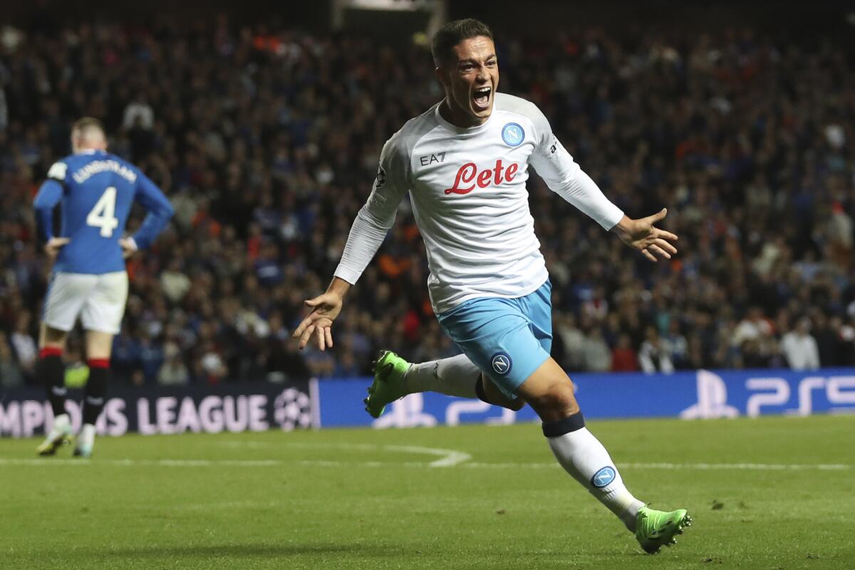 Napoli's Giacomo Raspadori celebrates after scoring his side's second goal during the Champions League group A soccer match between Rangers and Napoli at the Ibrox stadium in Glasgow, Scotland, Wednesday, Sept. 14, 2022. (AP Photo/Scott Heppell)