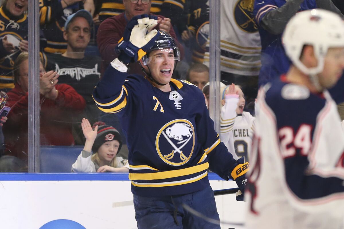Buffalo Sabres forward Evan Rodrigues (71) celebrates his goal during the first period of an NHL hockey game against the Columbus Blue Jackets, Saturday, Feb. 1, 2020, in Buffalo, N.Y. (AP Photo/Jeffrey T. Barnes)