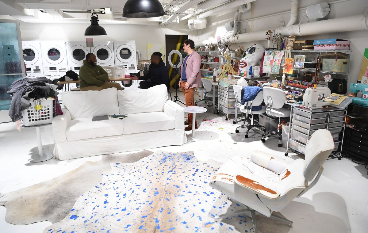 The laundry and art room in the basement