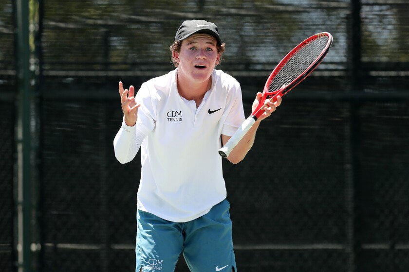 Corona del Mar's Jack Cross reacts after losing 7-6 (7-3) to University's Ani Gupta at The Claremont Club on Friday.