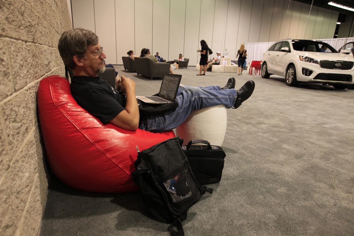 Charles Ross, of Riverside, Calif., hangs out at the Parents Lounge at VidCon at the Anaheim Convention Center on July 23, 2015. The three-day conference features more than 300 of the most innovative and influential YouTube creators.