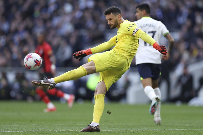 Tottenham's goalkeeper Hugo Lloris kicks the ball during the English Premier League soccer match.