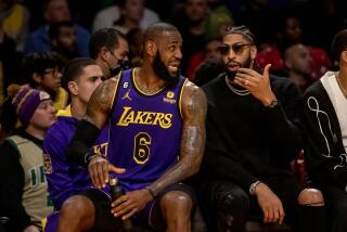 LOS ANGELES, CA - DECEMBER 23, 2022: Injured Los Angeles Lakers forward Anthony Davis chats.