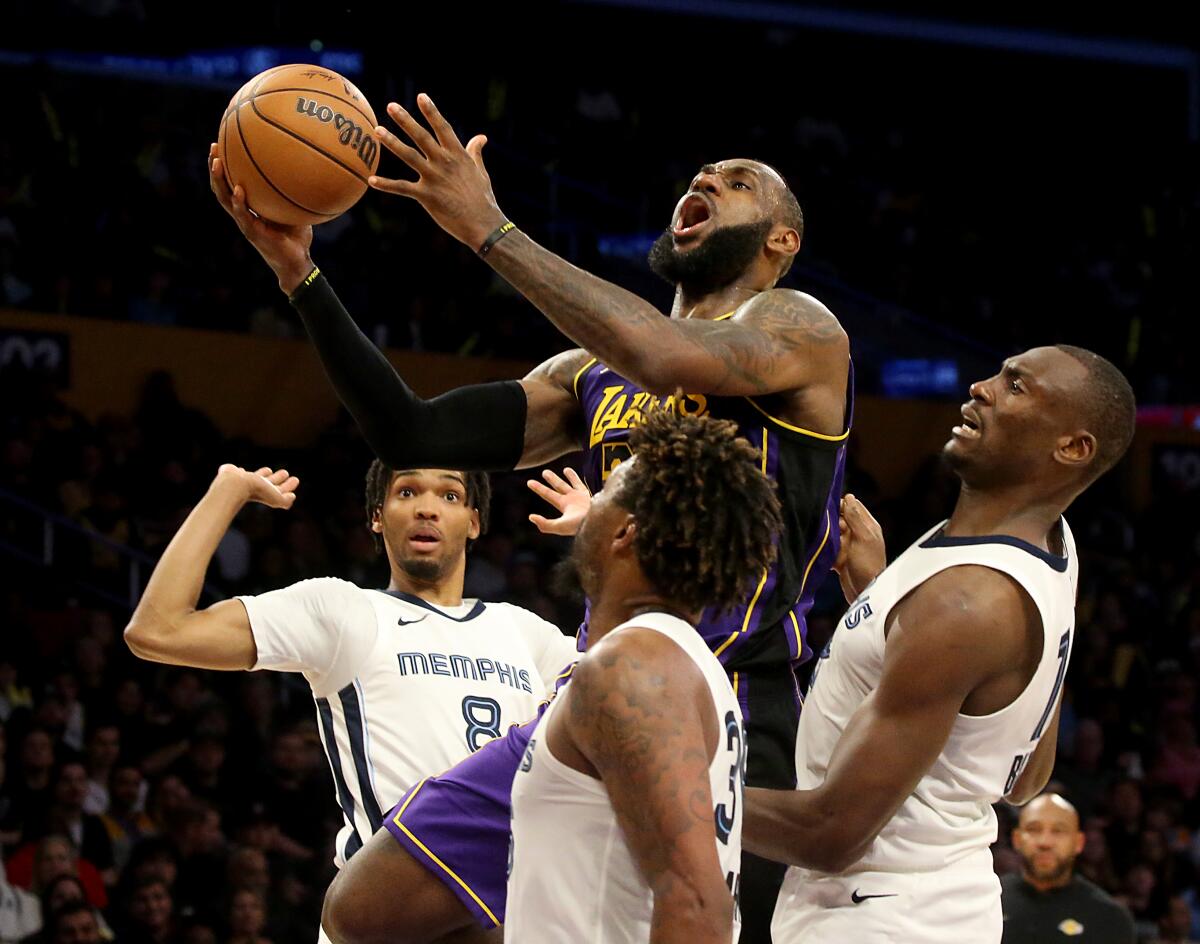 Lakers star Lebron James drives to the basket during a 127-113 loss to the Memphis Grizzlies at Crypto.com Arena.