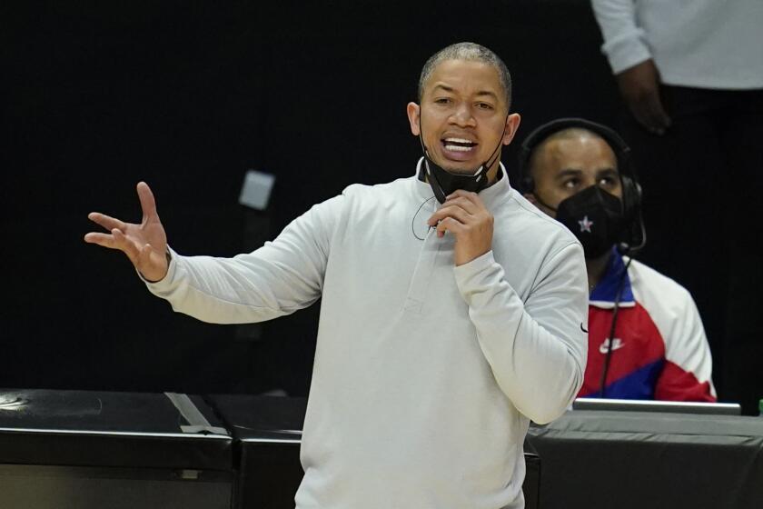 Los Angeles Clippers head coach Tyronn Lue yells from the bench during the second half of an NBA basketball game against the Los Angeles Lakers Sunday, April 4, 2021, in Los Angeles. (AP Photo/Marcio Jose Sanchez)