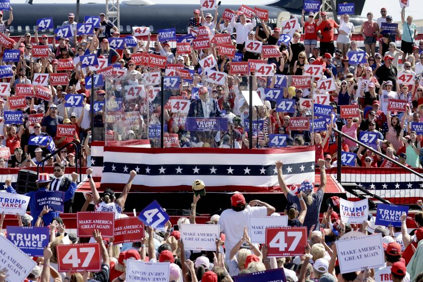 Republican presidential nominee former President Donald Trump speaks at a campaign rally at Wilmington International Airport in Wilmington, N.C., Saturday, Sept. 21, 2024. (AP Photo/Chris Seward)