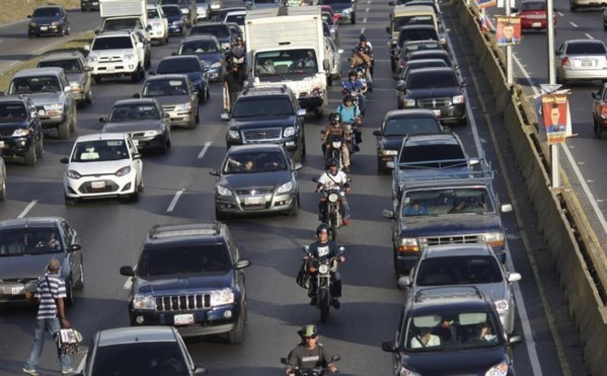 Commuters wait in heavy traffic on a main highway in Caracas. Venezuela, one of the many destinations for record fuel exports from U.S. refineries.