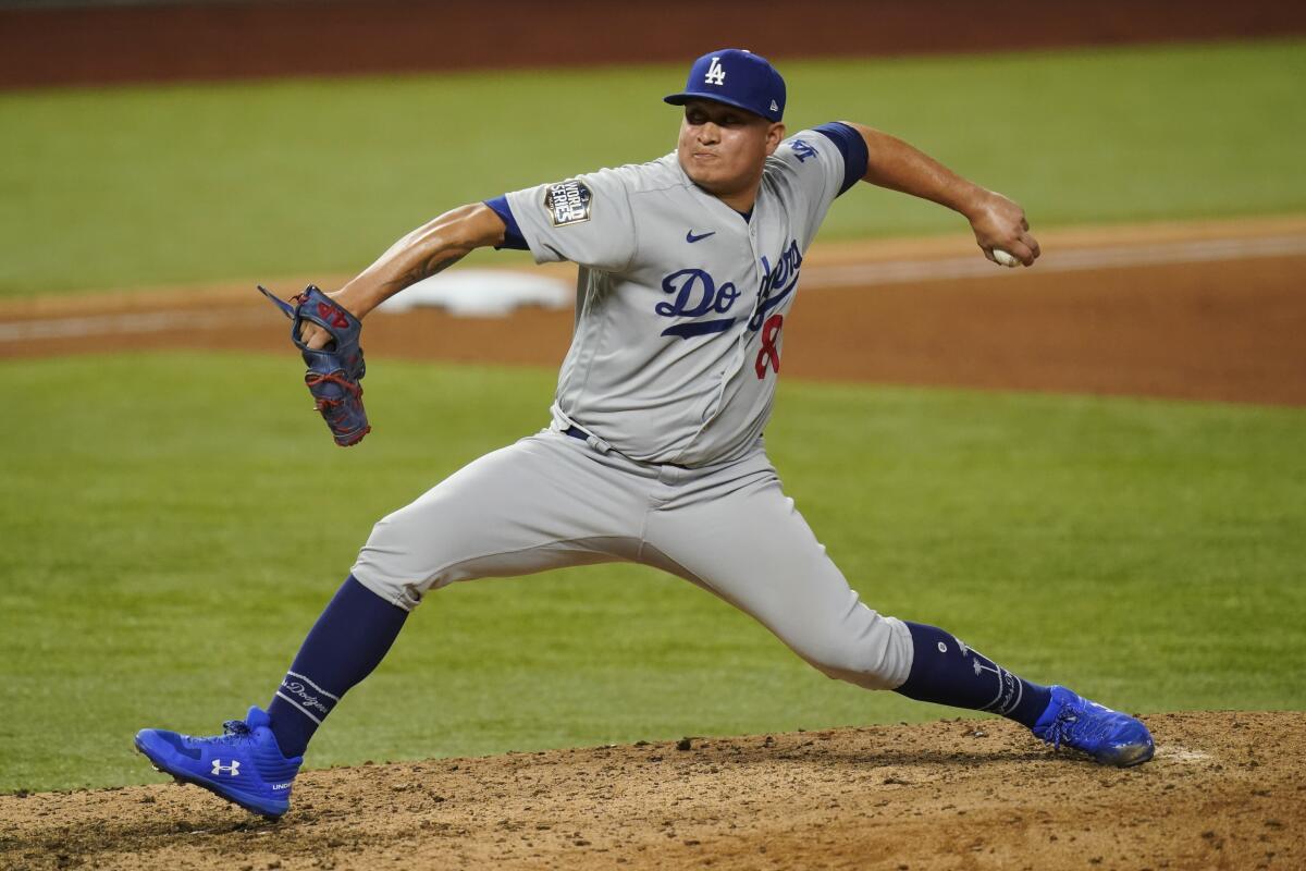 Dodgers pitcher Victor González throws against the Tampa Bay Rays during the eighth inning of Game 5.