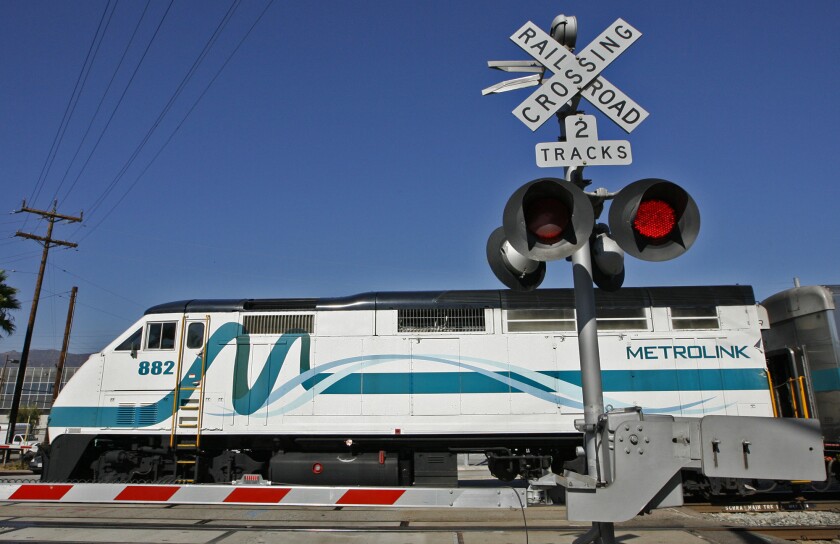 A Metrolink train crosses Grandview Avenue in Glendale in this file photo taken on Thursday, Sept. 20, 2012. Metro is expected to break ground on a new Metrolink station near Hollywood Burbank Airport in February.