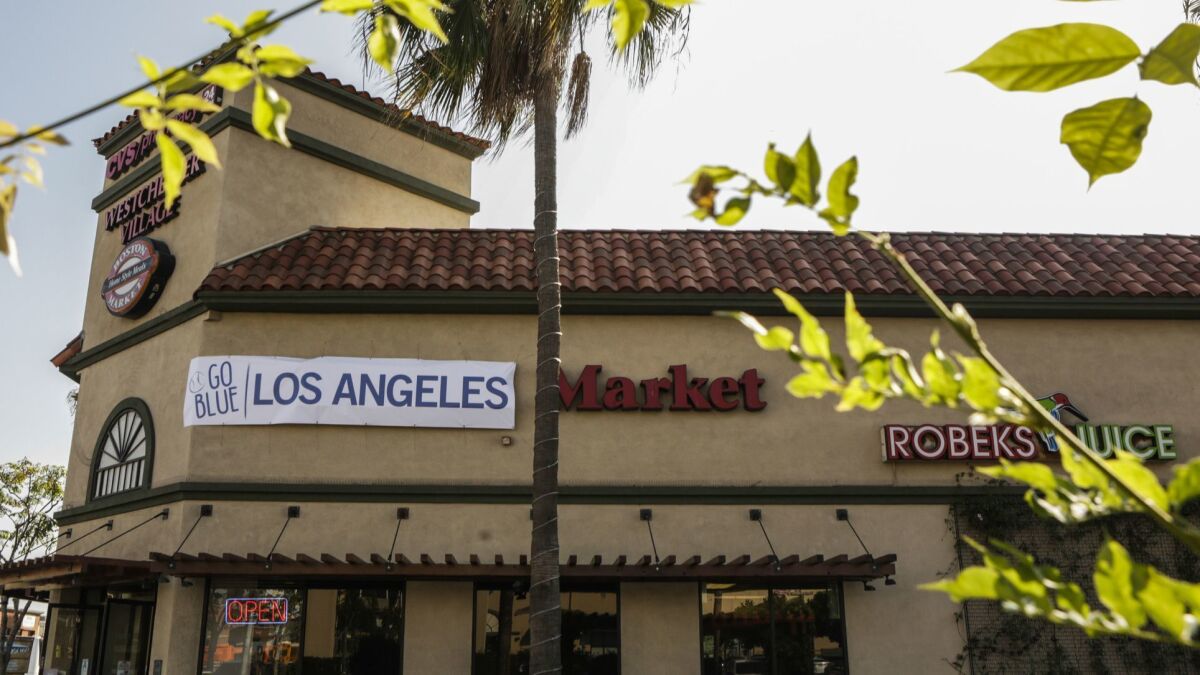 Ten Southern California Boston Market restaurants have hung banners with the words “Los Angeles” covering “Boston” in the restaurant’s name while the Dodgers are playing the Red Sox in the World Series.