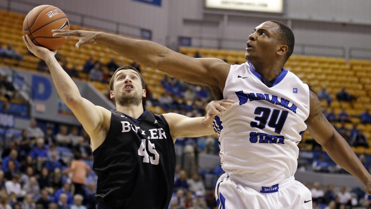 Indiana State forward Brandon Murphy (34) tries to block a shot Butler forward Andrew Chrabascz during the first half Wednesday.