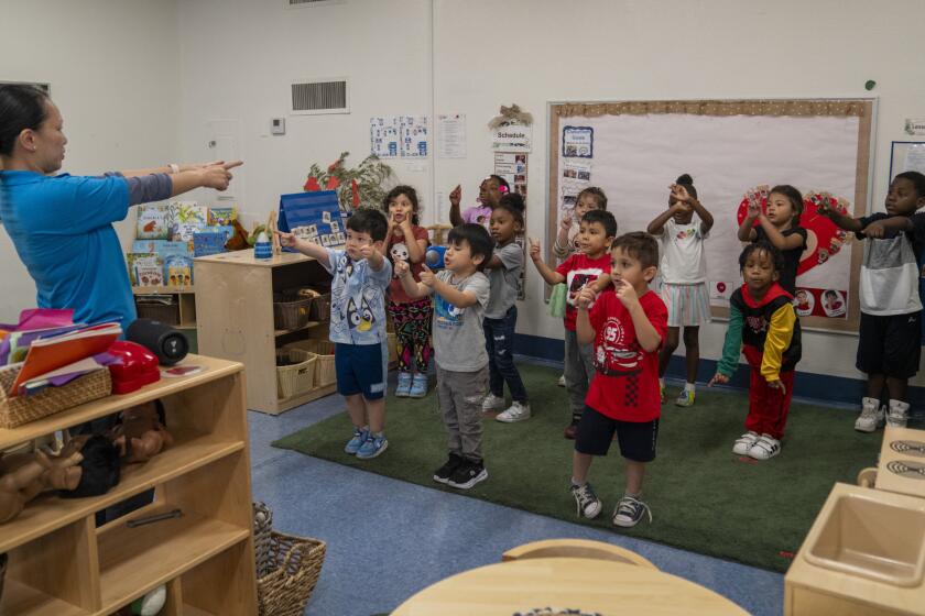 Kids in a clasroom.