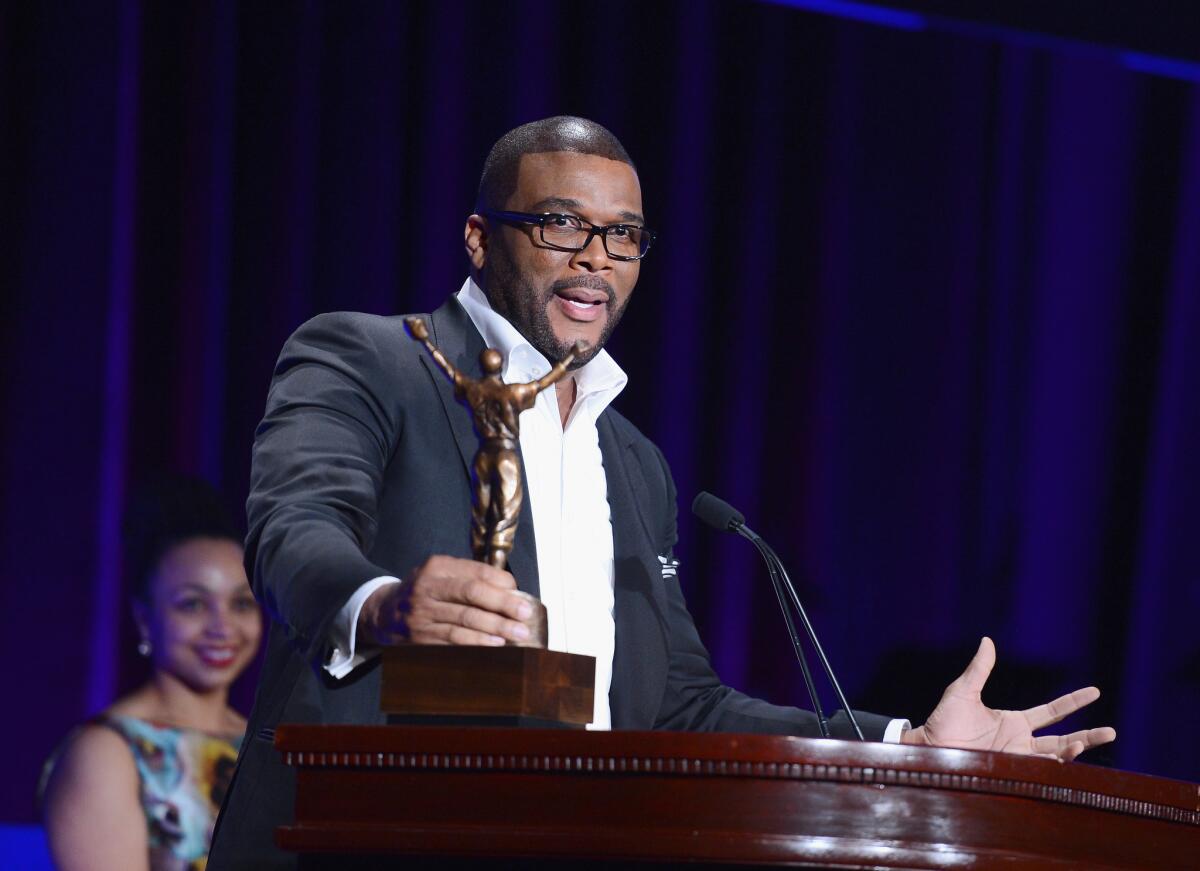 Tyler Perry speaks after receiving the ROBIE Humanitarian Award from the Jackie Robinson Foundation on Monday at the Waldorf Astoria Hotel in New York.