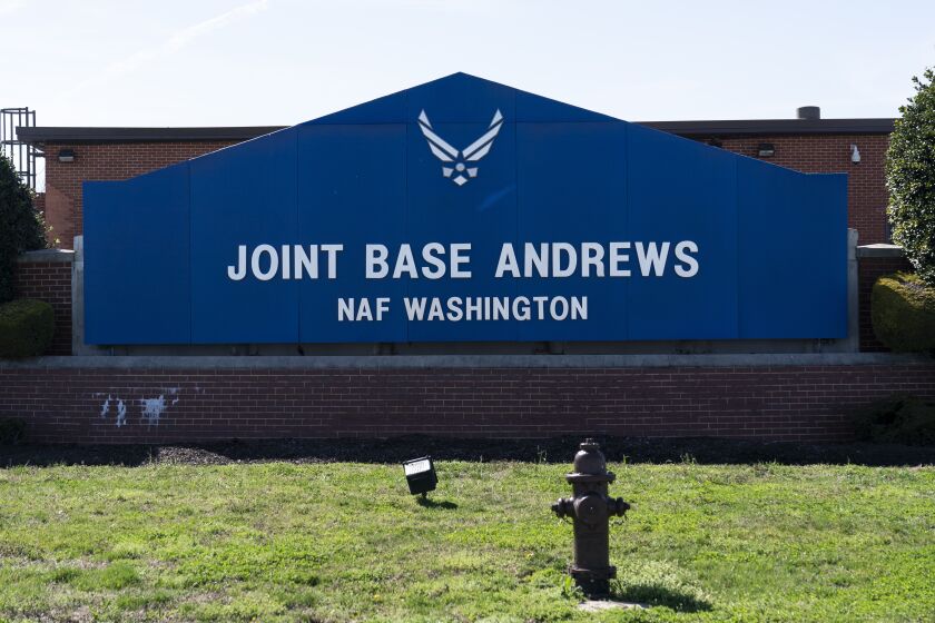 FILE - The sign for Joint Base Andrews is seen on March 26, 2021, at Andrews Air Force Base, Md. Joint Base Andrews has been locked down for reports of a man carrying an “assault-style” rifle on Thursday, March 30, 2023, authorities said. (AP Photo/Alex Brandon, File)