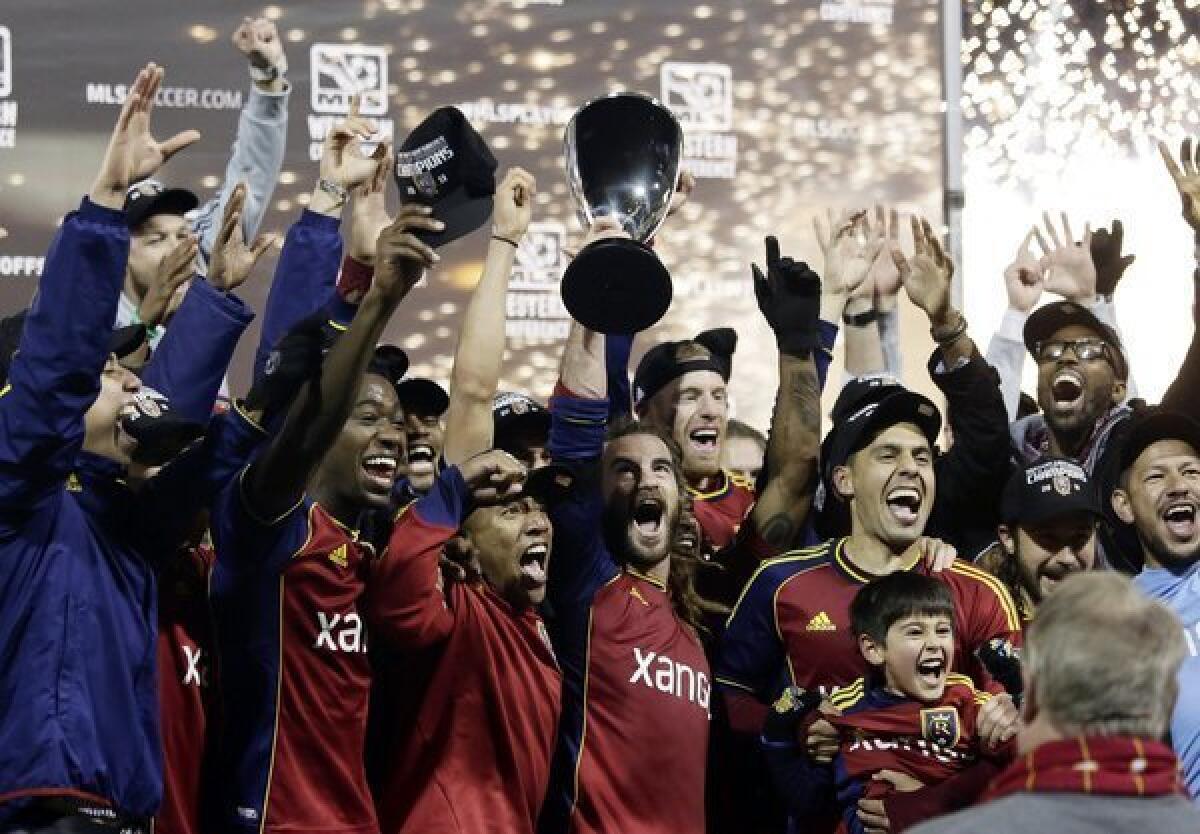 Members of Real Salt Lake celebrate their Western Conference final victory over over the Portland Timbers on Nov. 24. Real will face Eastern Conference champ Sporting Kansas City for the MLS Cup on Dec. 7.