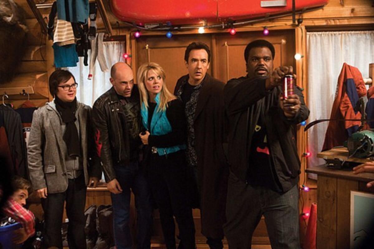 BEHIND THE TIMES: Clark Duke, left, Rob Corddry, Collette Wolfe, John Cusack and Craig Robinson.