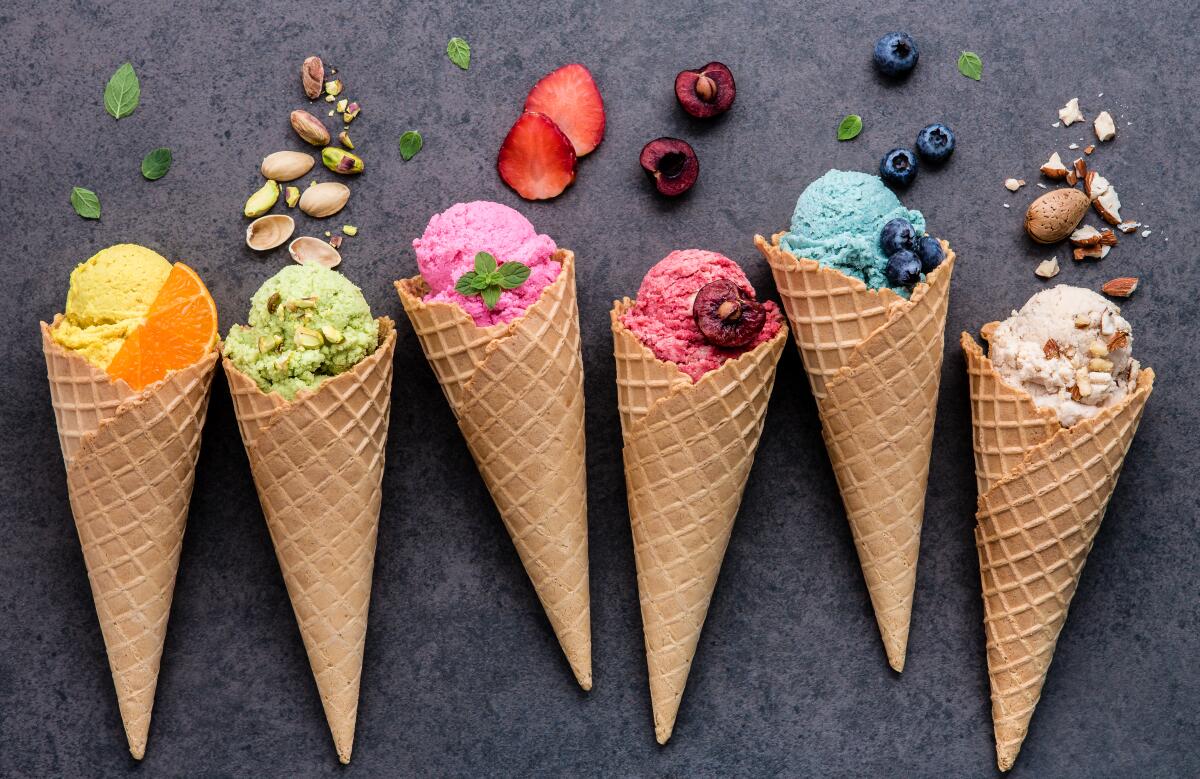 Various of ice cream flavor in cones blueberry ,strawberry ,pistachio ,almond ,orange and cherry 