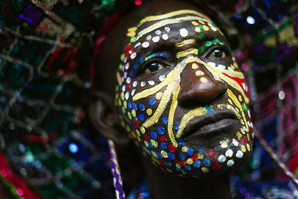 A man takes part in a parade celebrating Carnival in the Haitian capital, Port-au-Prince.