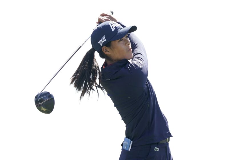 Celine Boutier tees off on the first hole during the final round of the Drive On Championship golf tournament, Sunday, March 26, 2023, in Gold Canyon, Ariz. (AP Photo/Darryl Webb)