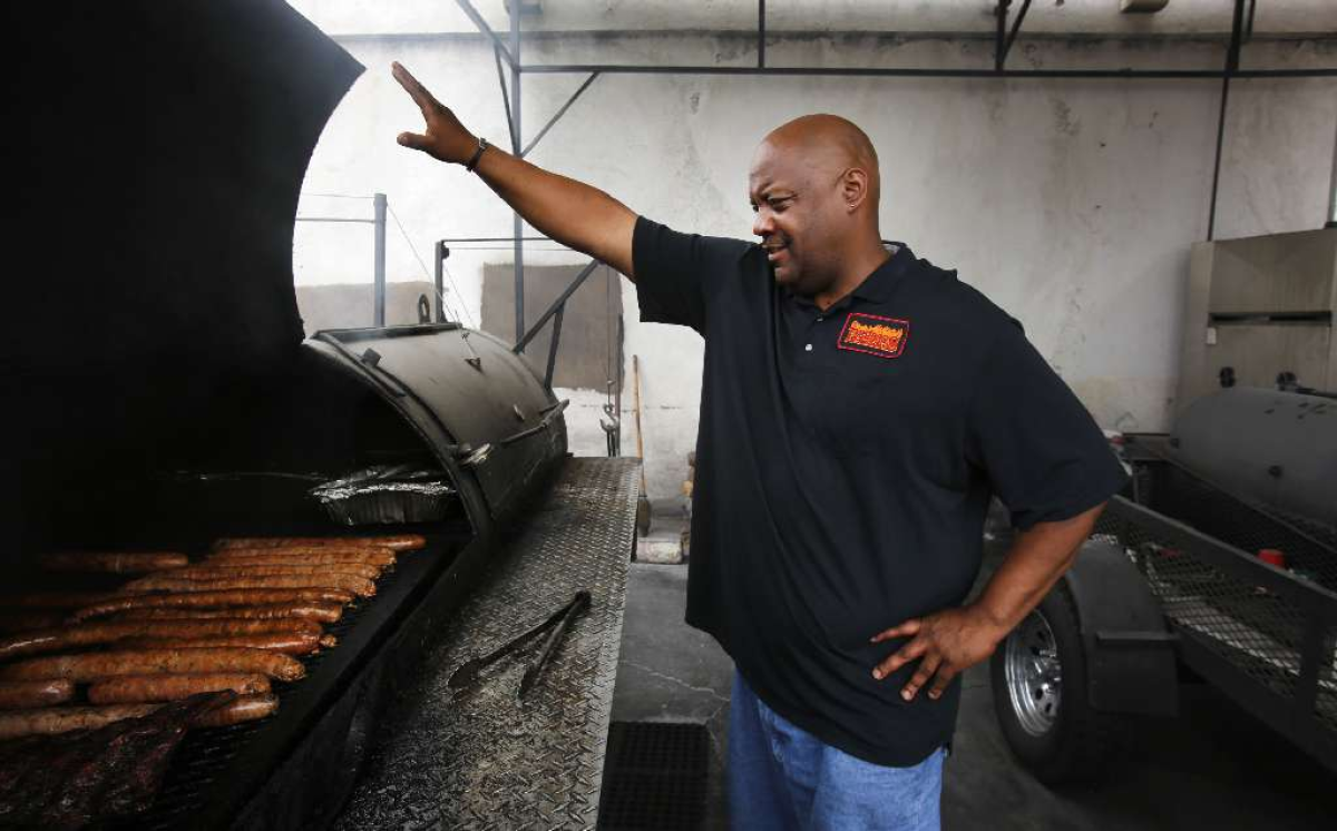 Kevin Bludso at his well-known barbecue spot in Compton. He's just opened Bludso's Bar & Que on La Brea Avenue in the old Tar Pit location. No more trekking to Compton for barbecue fanatics who live midtown.