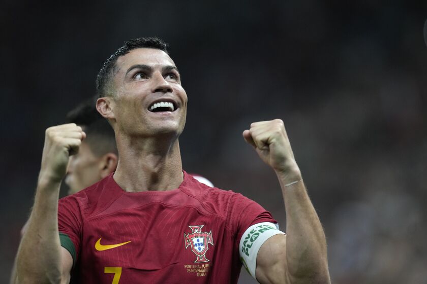 Portugal's Cristiano Ronaldo celebrates his side's opening goal during the World Cup group H soccer match between Portugal and Uruguay, at the Lusail Stadium in Lusail, Qatar, Monday, Nov. 28, 2022. (AP Photo/Themba Hadebe)