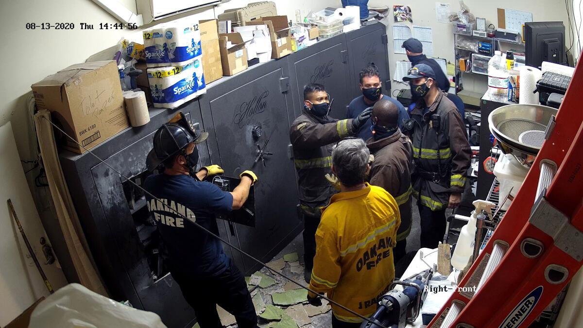 Aug. 2020 surveillance footage shows firefighter receiving treatment following a raid at the Zide Door Church in Oakland.