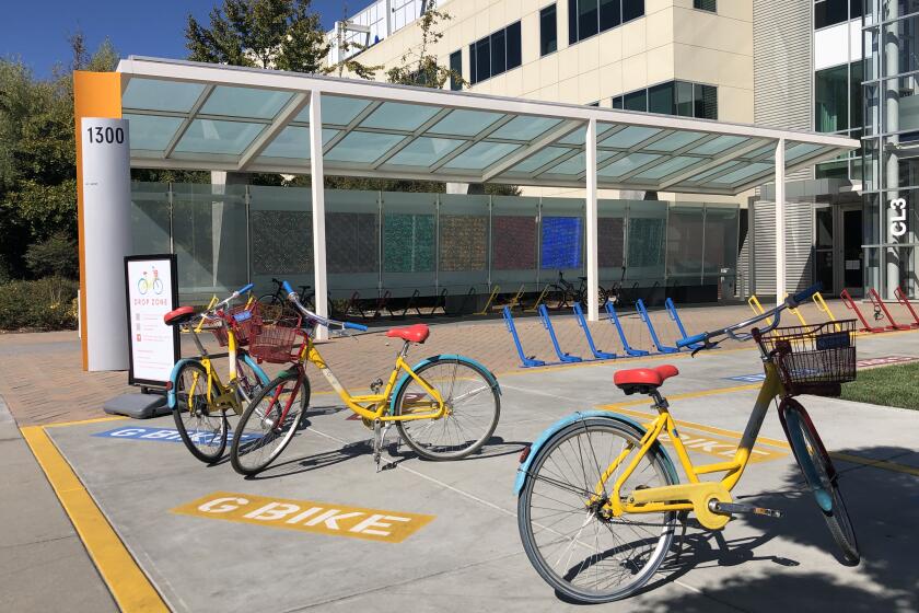 Company bikes sit outside an office building on Google's Mountain View campus.