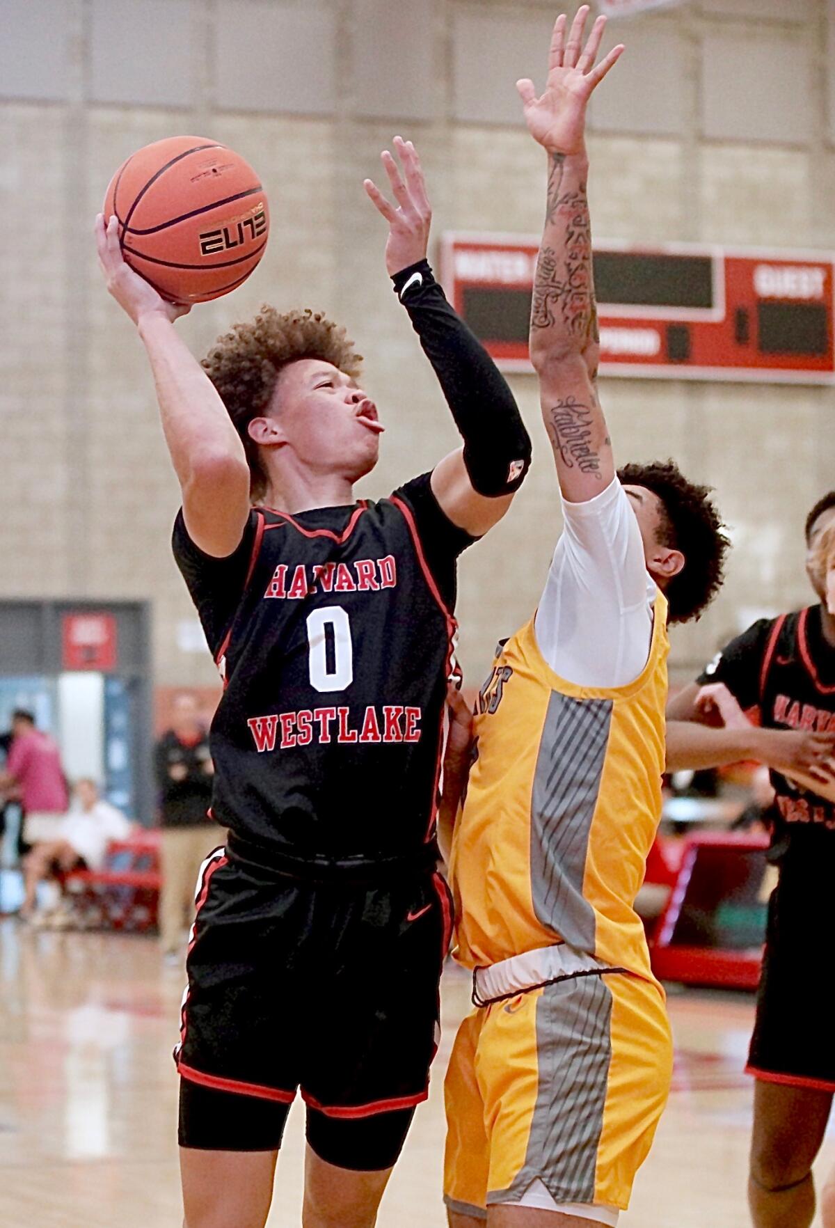 Trent Perry scores two of his game-high 17 points for Harvard-Westlake in Saturday’s win against Foothill.