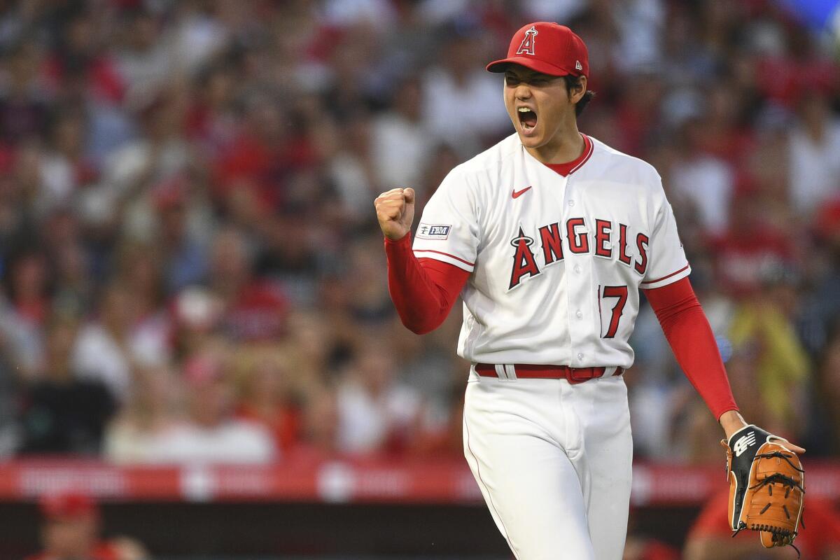 Angels pitcher Shohei Ohtani celebrates during Friday's game against the Kansas City Royals.