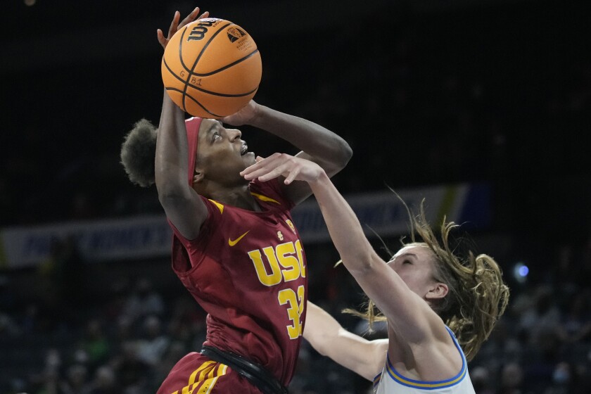 UCLA handles USC in Pac-12 women's basketball tourney opener - Los Angeles Times 2 UCLA's Chantel Horvat fouls USC's Jordyn Jenkins.