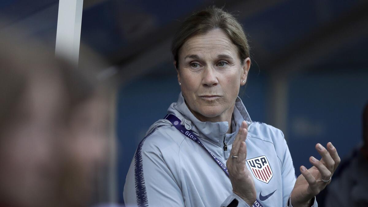U.S. women's national team coach Jill Ellis applauds prior to a match against Thailand at the Women's World Cup.