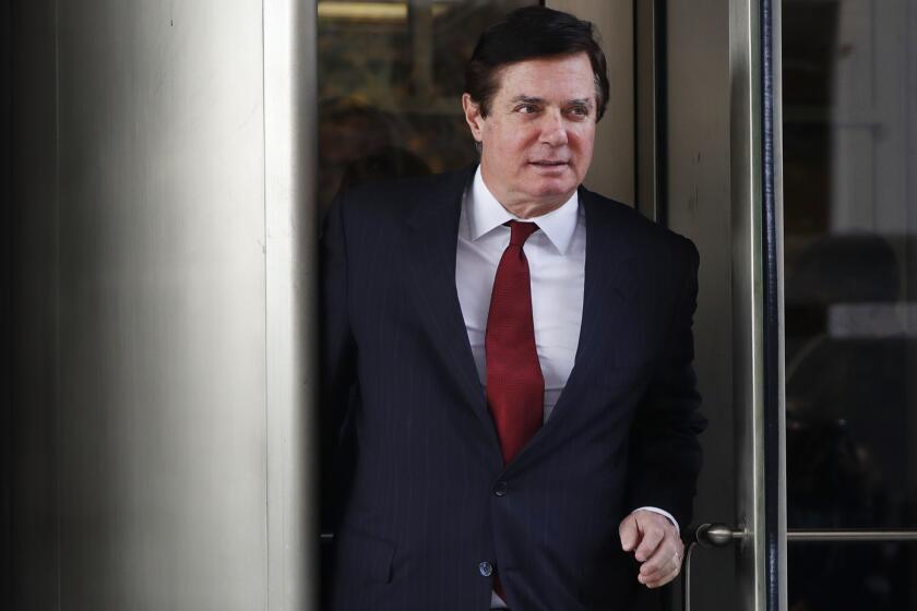 In this Nov. 6, 2017 photo, Paul Manafort, President Donald Trump's former campaign chairman, leaves the federal courthouse in Washington. A federal judge in Washington says special counsel Robert Mueller was working within his authority when he brought charges against President Donald Trumpâs former campaign chairman. (AP Photo/Jacquelyn Martin)